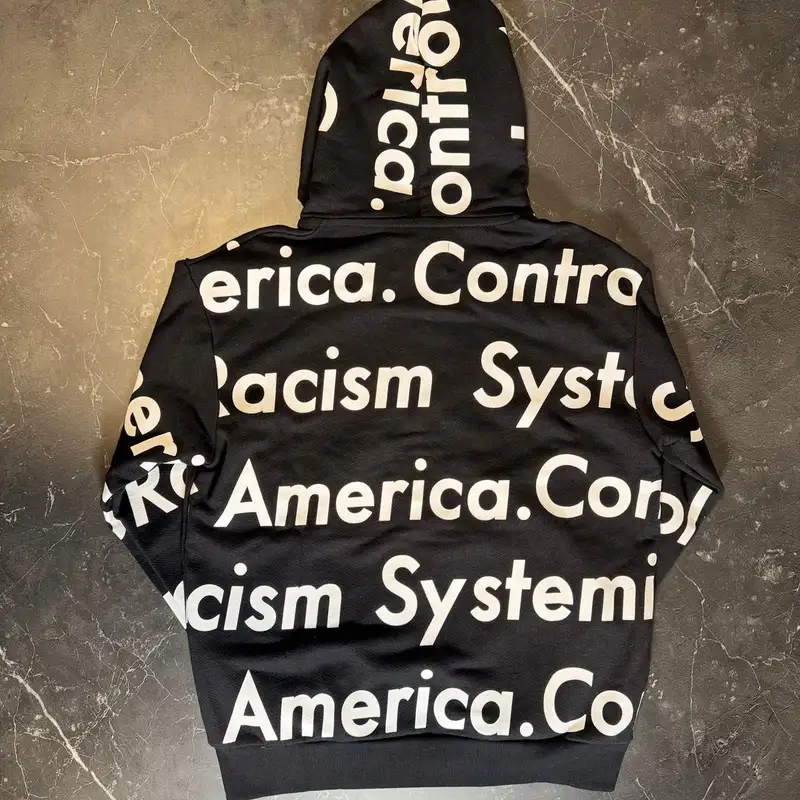 Denim Tears Racism Controls America Zip Up Black 2